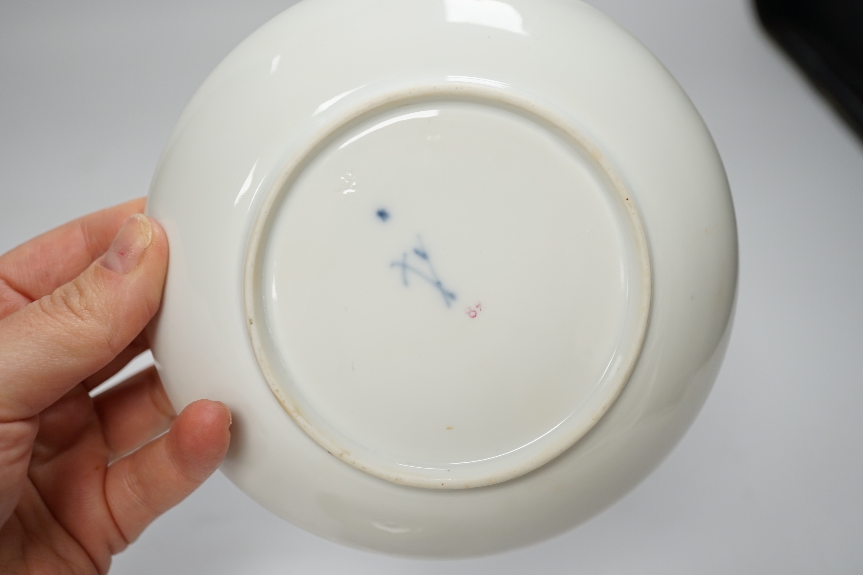 A 19th century Meissen plate and a late 18th century Meissen tea bowl and associated saucer, plate 20cm